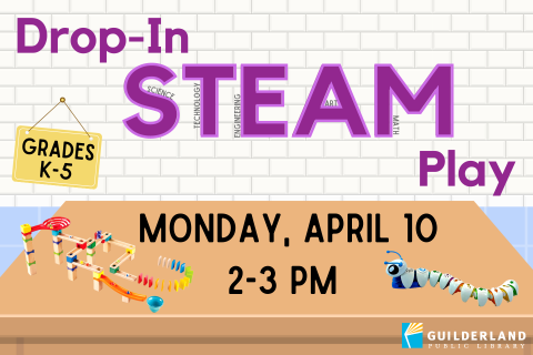 Drop-In STEAM Play promo image - a brown table with a marble run and Code-a-Pillar on it. A white brick wall and blue tile floor. 