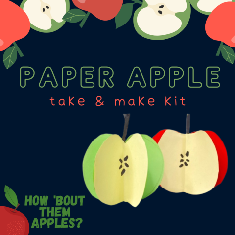 two paper apples with apple graphics border in red and green on navy background