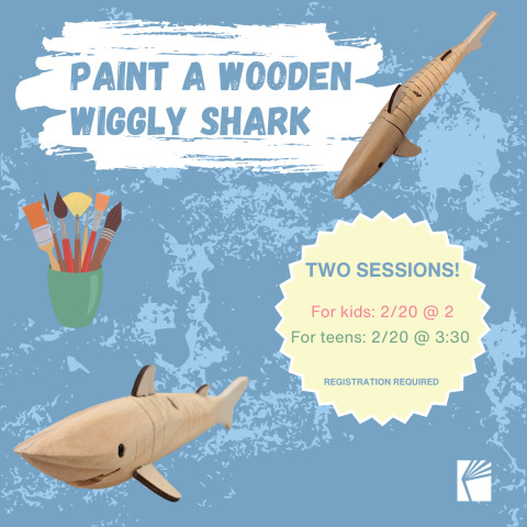 An unpainted wooden shark