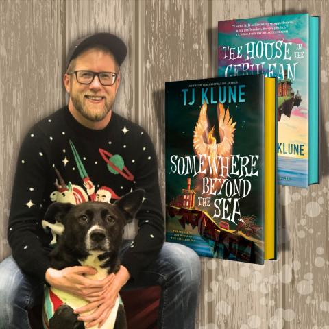 Photo of author TJ Klune smiling with his dog, adjacent to the covers of some of his books