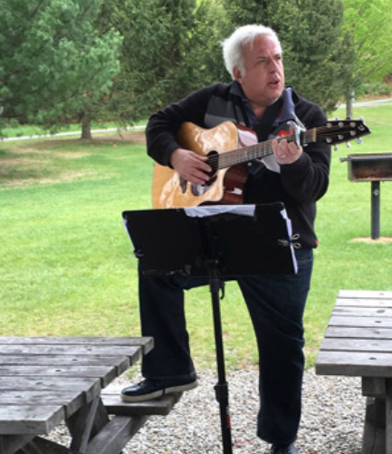 a man playing guitar